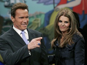 California governor Arnold Schwarzenegger and his wife Maria Shriver greet supporters before he is sworn in for second term as his wife Maria Shriver looks on Jan. 5, 2007 in Sacramento, Calif.