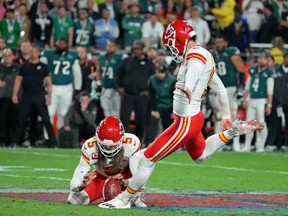 Glendale, Arizona, US; Kansas City Chiefs place kicker Harrison Butker (7) kicks a field goal against the Philadelphia Eagles during the fourth quarter of Super Bowl LVII at State Farm Stadium.