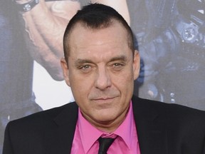 In this Aug. 11, 2014 file photo, actor Tom Sizemore arrives at the premiere of "The Expendables 3" in Los Angeles.