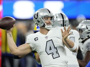 Las Vegas Raiders quarterback Derek Carr throws a pass during the first half of an NFL football game against the Los Angeles Rams, Dec. 8, 2022, in Inglewood, Calif.