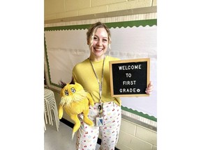 In this undated photo provided by her family and lawyers, Abigail Zwerner, a first-grade teacher at Richneck Elementary School in Newport News, Va., is shown inside her classroom.