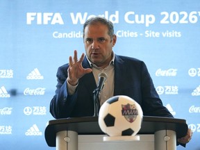 Victor Montagliani, FIFA vice president and CONCACAF president, speaks during a news conference at Hard Rock Stadium in Miami Gardens, Fla., Sept. 23, 2021.