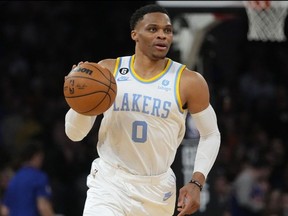 FILE - Los Angeles Lakers' Russell Westbrook brings the ball up during the second half of the team's NBA basketball game against the New York Knicks on Jan. 31, 2023, in New York. The Lakers traded Westbrook to the Utah Jazz and reacquired guard D'Angelo Russell from Minnesota in a three-team, eight-player deal Wednesday night, Feb. 8, ahead of the NBA's trade deadline, a person with knowledge of the trade told The Associated Press.
