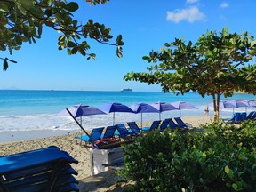 Watching cruise ships is a quiet way to pass the time while getting some sun on the private beach at Divi Little Bay Beach Resort.
