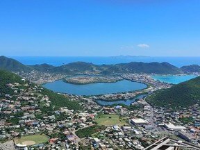 The incredible blue-dominated view of Philipsburg (right) and the Great Salt Pond as seen from the zipline atop Sentry Hill in St. Maarten.