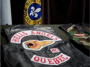 Sûreté du Québec display Hells Angels vests in 2018.