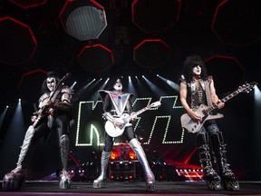Gene Simmons, left, Tommy Thayer and Paul Stanley, of KISS, perform their End of the Road farewell tour in Montreal, Quebec on Aug. 16, 2019.