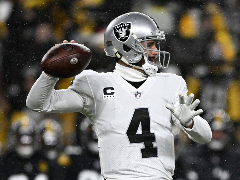 New Orleans Saints quarterback Derek Carr (4) throws a pass against the  Tennessee Titans in the