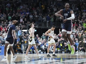 Joe Munden Jr. of the Fairleigh Dickinson Knights celebrates after beating the Purdue Boilermakers 63-58 in the first round of the NCAA Men's Basketball Tournament at Nationwide Arena on March 17, 2023 in Columbus, Ohio.