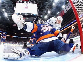 Ilya Sorokin of the New York Islanders makes the second period save on David Kampf of the Toronto Maple Leafs at the UBS Arena on March 21, 2023 in Elmont, New York.