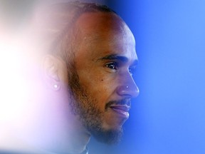 Lewis Hamilton of Great Britain and Mercedes talks to the media in the Paddock during previews ahead of the F1 Grand Prix of Australia at Albert Park Grand Prix Circuit on March 30, 2023 in Melbourne, Australia.