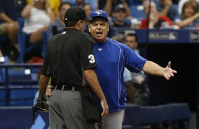 Manager John Gibbons #5 of the Toronto Blue Jays has a discussion with home plate umpire Pat Hoberg #31 after being ejected from the game by Hoberg during the fourth inning of a game against the Tampa Bay Rays on September 4, 2016 at Tropicana Field in St. Petersburg, Florida. (Photo by Brian Blanco/Getty Images)