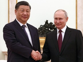 Russian President Vladimir Putin meets with China's President Xi Jinping at the Kremlin in Moscow on March 20, 2023.