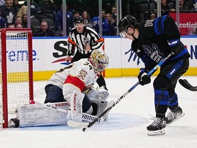 Panthers goaltender Alex Lyon stops Maple Leafs forward Mitchell Marner on a breakaway during the third period at Scotiabank Arena in Toronto, Wednesday, March 29, 2023.
