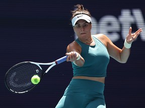 Bianca Andreescu of Canada plays a forehand against Sofia Kenin at Hard Rock Stadium on March 26, 2023 in Miami Gardens, Florida.