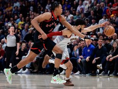 Mar 6, 2023; Denver, Colorado, USA; Denver Nuggets guard Jamal Murray (27) and Toronto Raptors forward Scottie Barnes (4) battle for a loose ball in the fourth quarter at Ball Arena.
