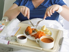 A patient eats her lunch prepared at AZ Groeninge Hospital in Kortrijk, Belgium, March 13, 2023.