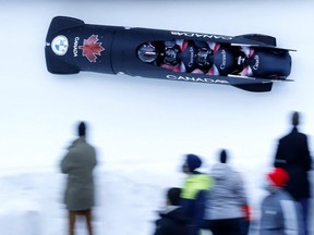 Bobsleigh - Bob & Skeleton World Cup and IBSF European Championships - Saint-Moritz, Switzerland - January 16, 2022 Canada's Justin Kripps, Ryan Sommer, Cam Stones and Jay Dearborn in action during the Four-Man Bobsleigh.