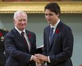 Prime Minister Justin Trudeau shakes hands with Governor General David Johnston after being sworn in as prime minister of Canada at Rideau Hall in Ottawa on Wednesday, Nov. 4, 2015. 
