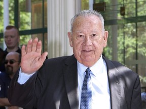 In this Sunday May 17, 2015 file photo, former soccer star Just Fontaine waves to photographers as he arrives at the UNFP, Union of French Professional Footballers, ceremony in Paris. (AP Photo/Remy de la Mauviniere, file)