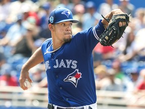 Blue Jays starting pitcher Jose Berrios throws against the Philadelphia Phillies during the first inning of spring training action in Dunedin, Fla., on Sunday, March 5, 2023.