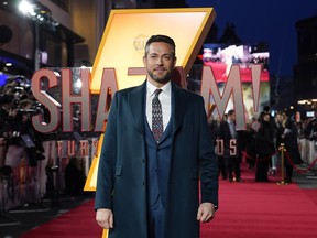 Zachary Levi poses for photographers upon arrival at the premiere of the film 'Shazam! Fury of the Gods' in London.