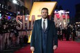 Zachary Levi poses for photographers upon arrival at the premiere of the film 'Shazam! Fury of the Gods' in London.