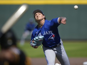 Blue Jays pitcher Ricky Tiedemann throws in the fifth inning of a spring training game against the Pittsburgh Pirates in Bradenton, Fla., Tuesday, March 7, 2023.