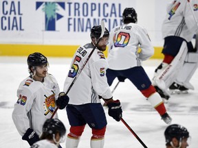 Florida Panthers defenceman Aaron Ekblad (5) warm up while wearing a Pride Night jersey before playing the Toronto Maple Leafs, Thursday, March 23, 2023, in Sunrise, Fla. (AP Photo/Michael Laughlin)