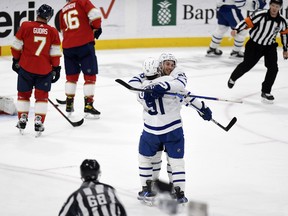 Maple Leafs' Michael Bunting (celebrates with teammate John Tavares after scoring a goal during the second period against the Florida Panthers, Thursday, March 23, 2023, in Sunrise, Fla.
