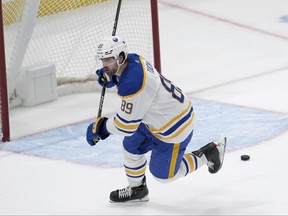 Buffalo Sabres right wing Alex Tuch (89) reacts after scoring an empty net goal against the San Jose Sharks during the third period of an NHL hockey game in San Jose, Calif., Saturday, Feb. 18, 2023.