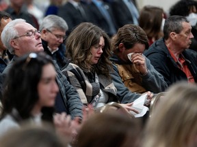 Families and friends listen to a tribute to victims before the Mass Casualty Commission delivers its final report into the April 2020 mass shootings, when a gunman who at one point masqueraded as a police officer caused country's worst mass shooting during a 12-hour rampage, in Truro, Nova Scotia, Canada, on March 30, 2023.