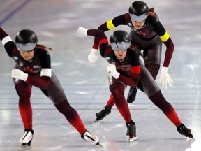 Valerie Maltais, Ivanie Blondin and Isabelle Weidemann of Canada skate to gold in the Team Pursuit Women race during the ISU World Speed Skating Championships at Thialf Ice Rink in Heerenveen, Netherlands on Friday. Dean Mouhtaropoulos/Getty Images