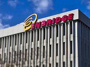 Enbridge Inc. signage is displayed outside of the company's corporate office in this photo taken with a tilt-shift lens in Toronto, Oct. 28, 2011.