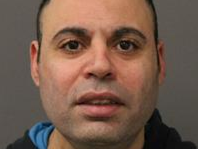 Felix Algai, 42, of Toronto, was charged with an assortment of gun-related and other offences on Feb. 25, 2023.