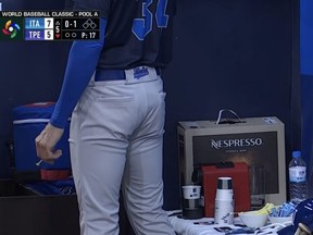 An espresso machine in Team Italy's dugout at the World Baseball Classic.