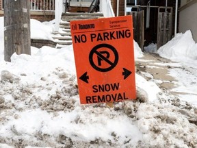 Toronto Police are conducting a ticket-and-towing blitz after warning motorists to not park on roads designated as snow routes.