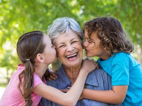 Grandmother feels pressure from her son's partner to treat her child the same as her grandkids.