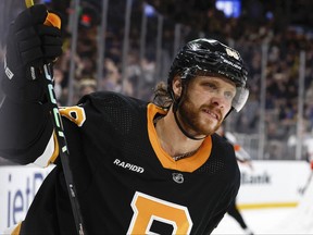 Feb 20, 2023; Boston, Massachusetts, USA; Boston Bruins right wing David Pastrnak (88) celebrates after scoring against the Ottawa Senators during the third period at TD Garden.