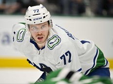 Feb 27, 2023; Dallas, Texas, USA; Vancouver Canucks left wing Anthony Beauvillier (72) looks for the puck in the face-off circle in the Dallas Stars zone during the first period at the American Airlines Center.