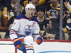 Feb 23, 2023; Pittsburgh, Pennsylvania, USA; Edmonton Oilers center Connor McDavid reacts after scoring a goal against the Pittsburgh Penguins during the first period at PPG Paints Arena.