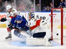 Jan 17, 2023; Toronto, Ontario, CAN; Toronto Maple Leafs forward Dryden Hunt (72) scores past Florida Panthers goalie Sergei Bobrovsky (72) and defenseman Josh Mahura (28) in the first period at Scotiabank Arena.