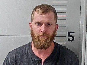 Kyle Chrisley is seen in a police booking photo at the Rutherford County Adult Detention Center after his arrest by the Smyrna, Tennessee Police Department on charges for aggravated assault on March 14, 2023 in Murfreesboro, Tennessee.