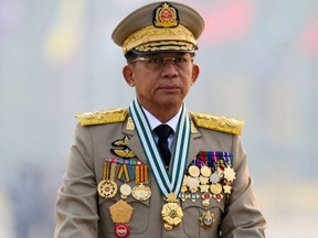 Myanmar's junta chief Senior General Min Aung Hlaing, who ousted the elected government in a coup on Feb. 1, 2021, presides at an army parade on Armed Forces Day in Naypyitaw, March 27, 2021.