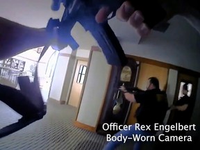 Screenshot: Nashville police released video Tuesday from a body-worn camera that shows a team of officers entering and searching The Covenant School, an elementary school,  on the morning of Monday March 27, 2023, then confronting and opening fire on an assailant who had murdered three children and three adults in the latest school shooting to roil the nation. (Metropolitan Nashville Police Department)