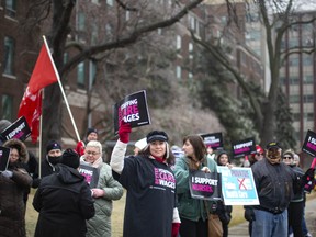 Nurses and supporters take part in a provincewide action day, organized by the Ontario Nurses Association, as they rally outside Windsor Regional Hospital - Ouellette Campus on Thursday, Feb. 23, 2023.