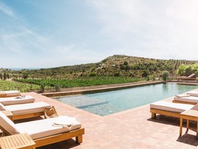 The Mediterranean Sea can be seen beyond the rows of vines from the pool deck of Villa Soleilla at Château L'Hospitalet. Soufiane Zaidi/Château L'Hospitalet Handout