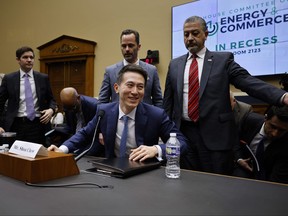 TikTok CEO Shou Zi Chew (centre) takes a break from testifying before the House Energy and Commerce Committee with Vice President for Public Policy Michael Beckerman (top centre) in the Rayburn House Office Building on Capitol Hill on March 23, 2023 in Washington, D.C.