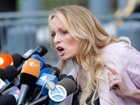 In this file photo taken April 16, 2018, adult film actress Stephanie Clifford, also known as Stormy Daniels, speaks at the U.S. Federal Court in Lower Manhattan, N.Y.
