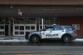 A Toronto Police cruiser is parked outside Wellesley subway station.
